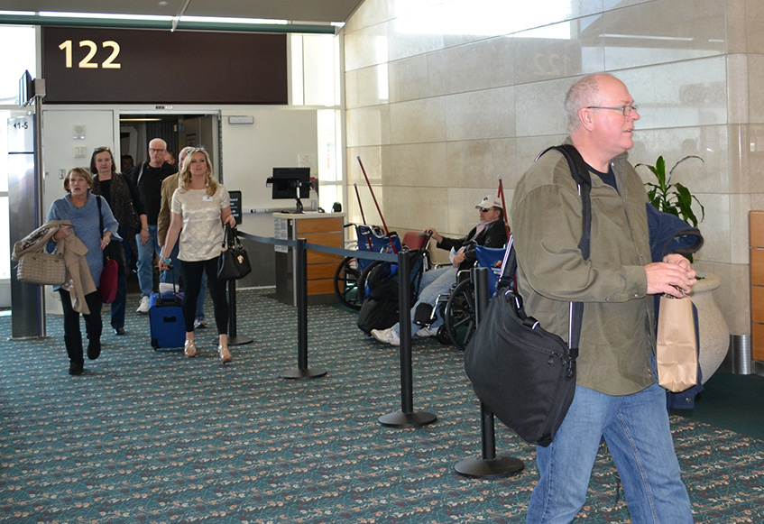 Passengers arriving at a gate