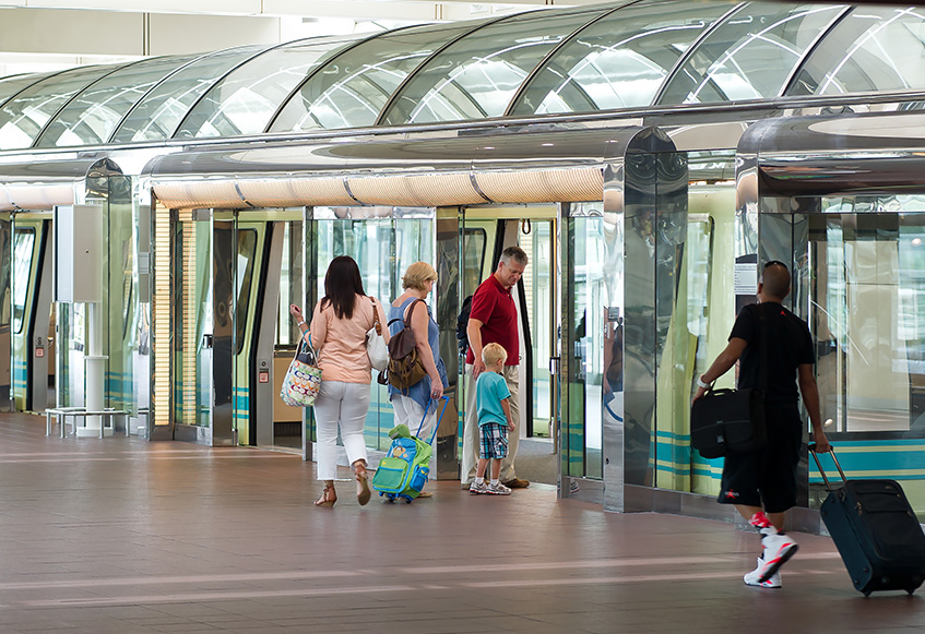 Boarding the shuttle to the Main Terminal Page Header Image